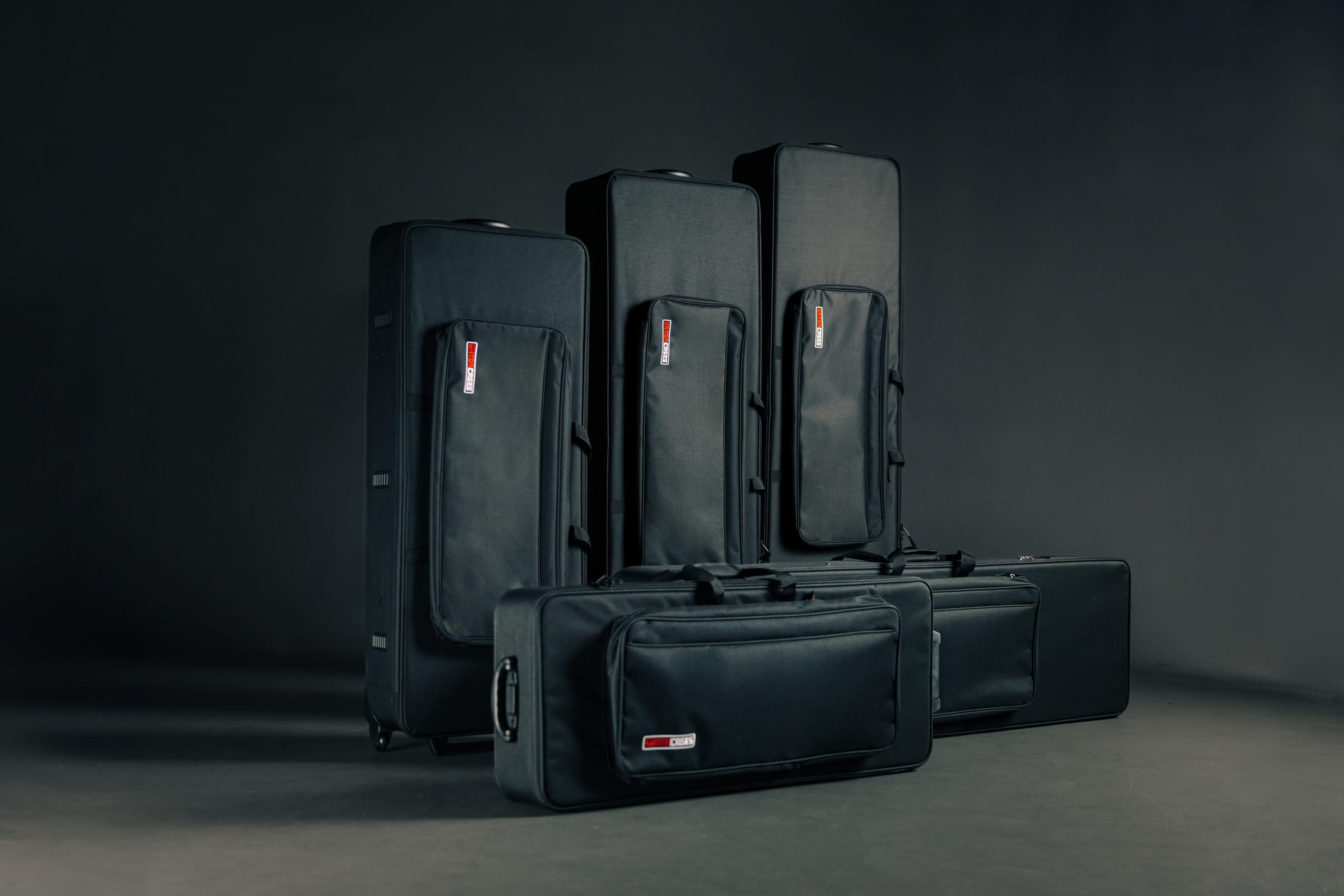 Gator Cases Lightweight Case with Retractable Pull Handle and Wheels Fits Standard 49 Note Keyboards and Electric Pianos, (GK-49)